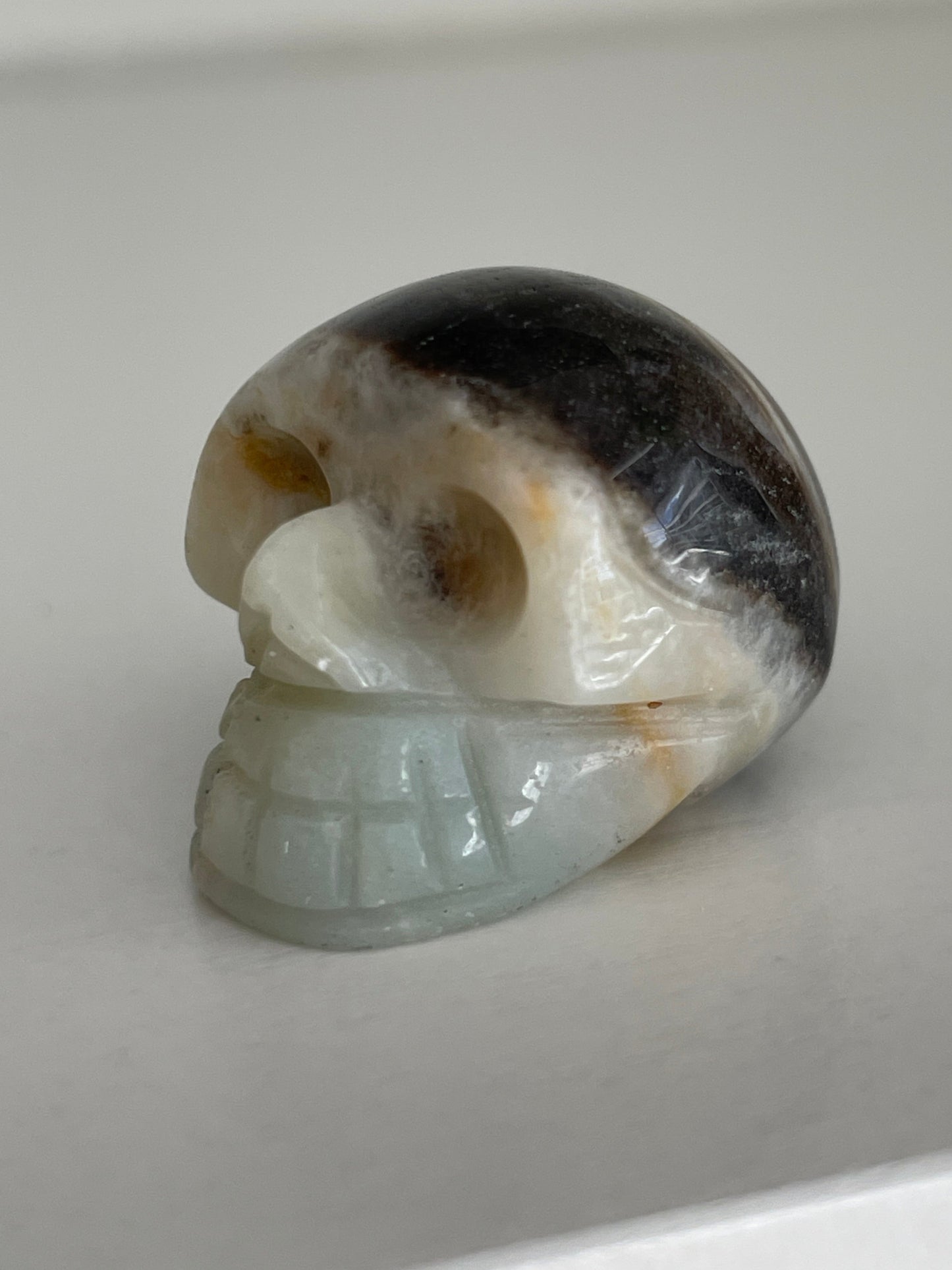 White and brown druzy calcite skull carving, mini crystal for energy work.