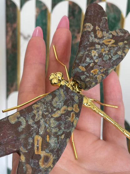 Rainforest Jasper Dragonfly Crystal Carving Natural Stone Display Piece Shimmery Multicolor Speckled Pattern Gold Details Metal Accented Design Spiritual Transformation Symbol Manifestation Focus Crystal Statement Collection Showcase Beautiful