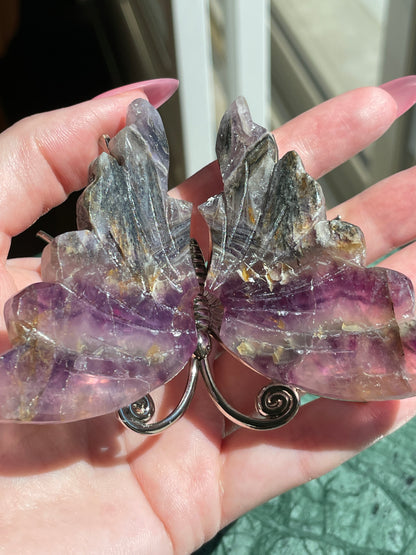 Feathered Root Fluorite Butterfly Crystal Carving Natural Stone Display Piece Purple Striped Pattern Gold Gray Details Metal Accented Design Spiritual Transformation Symbol Meditation Focus Object Crystal Collection Showcase Beautiful