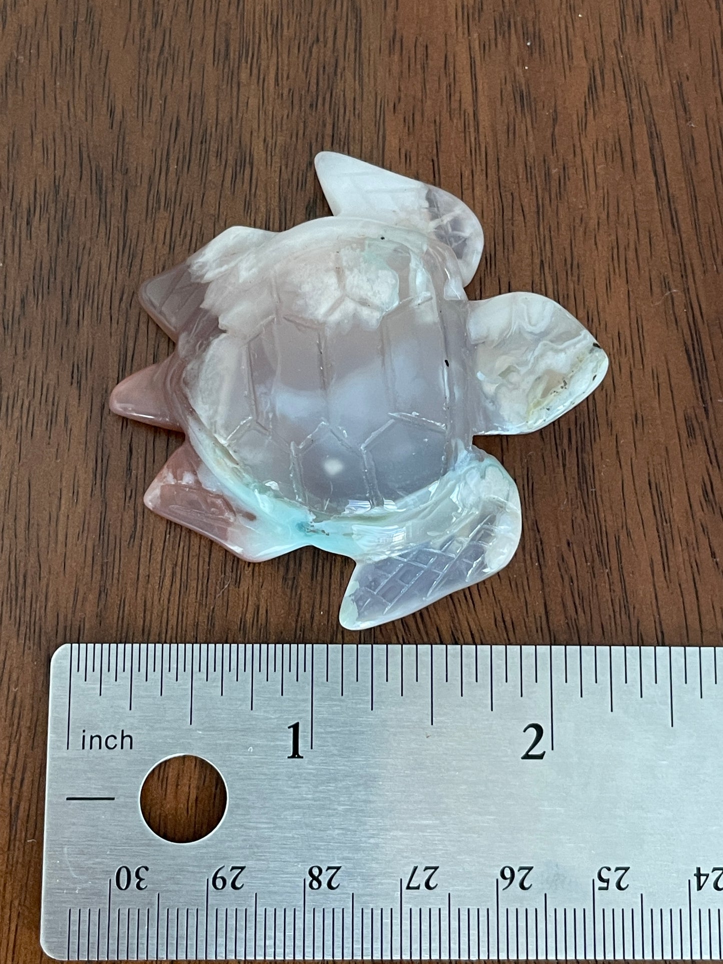 Healing crystal sea turtle made of green flower agate, symbolizing growth and harmony.
Crystal turtle carving, 2-inch green flower agate stone for altar or spiritual gift.
