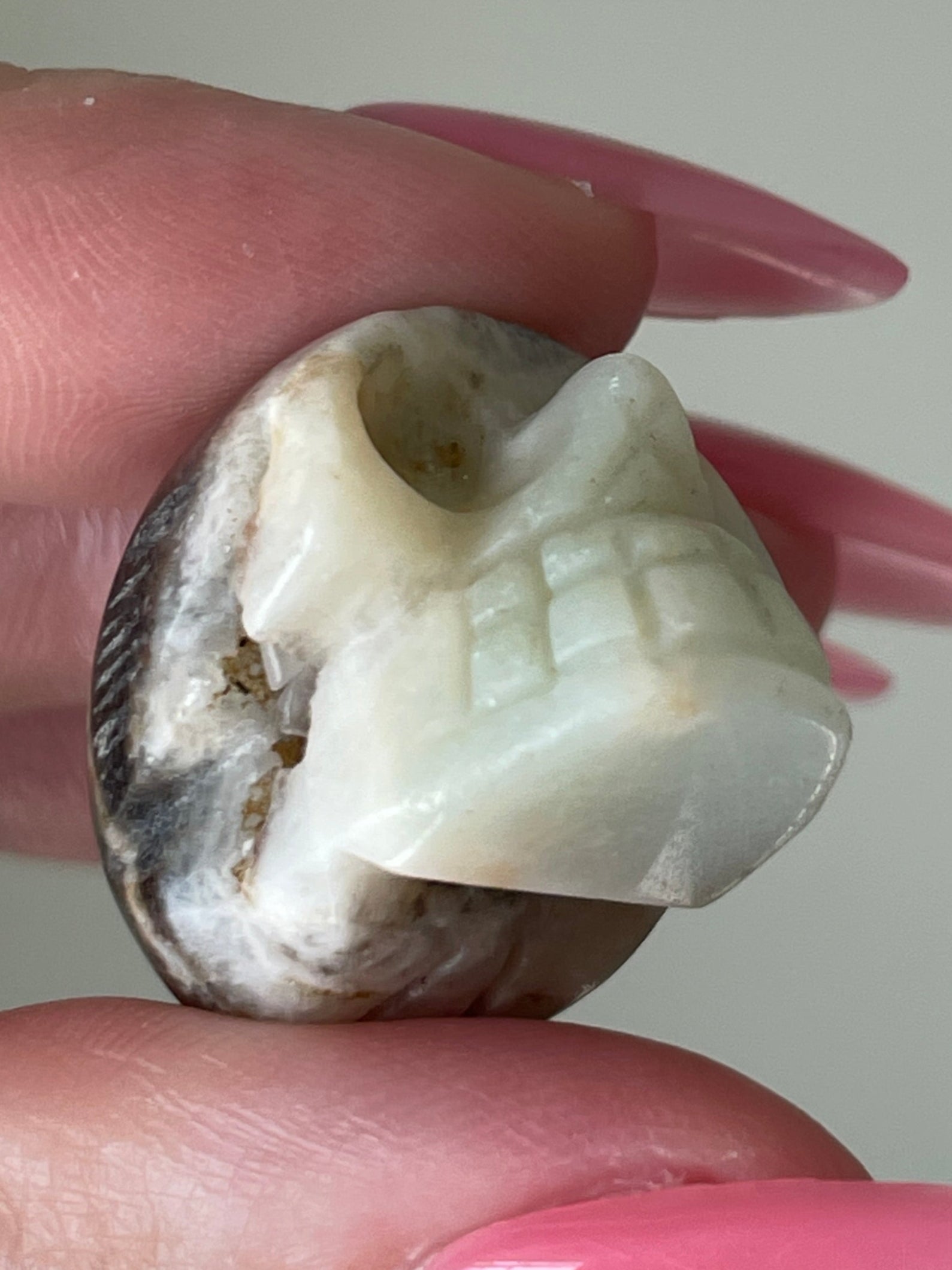 Sparkling druzy calcite skull, small white and brown crystal carving.