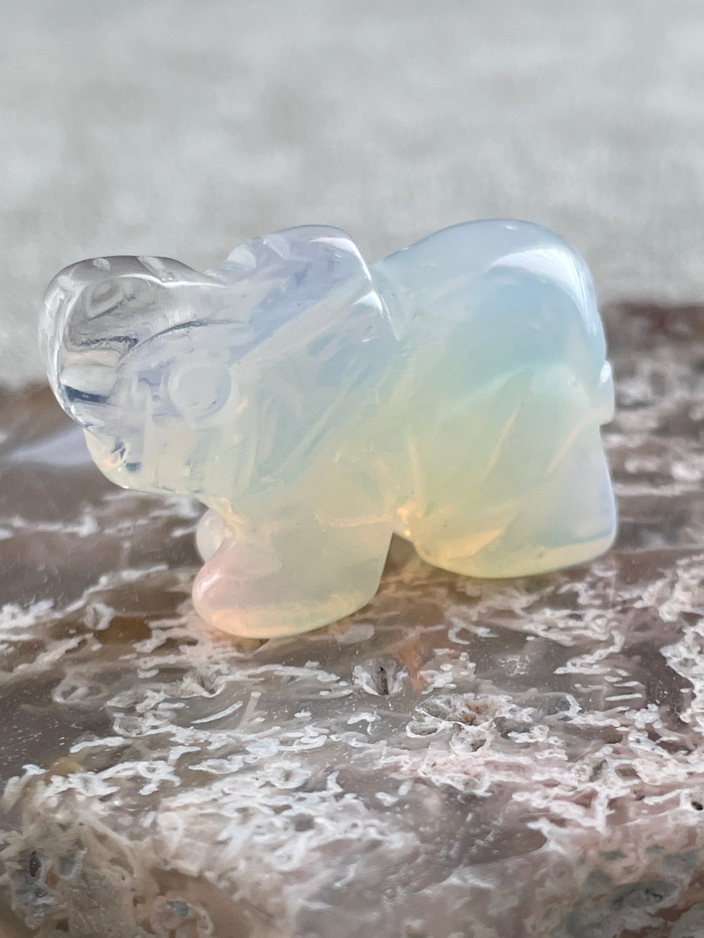 opalite elephant carving, glowing crystal figurine for healing energy and protection