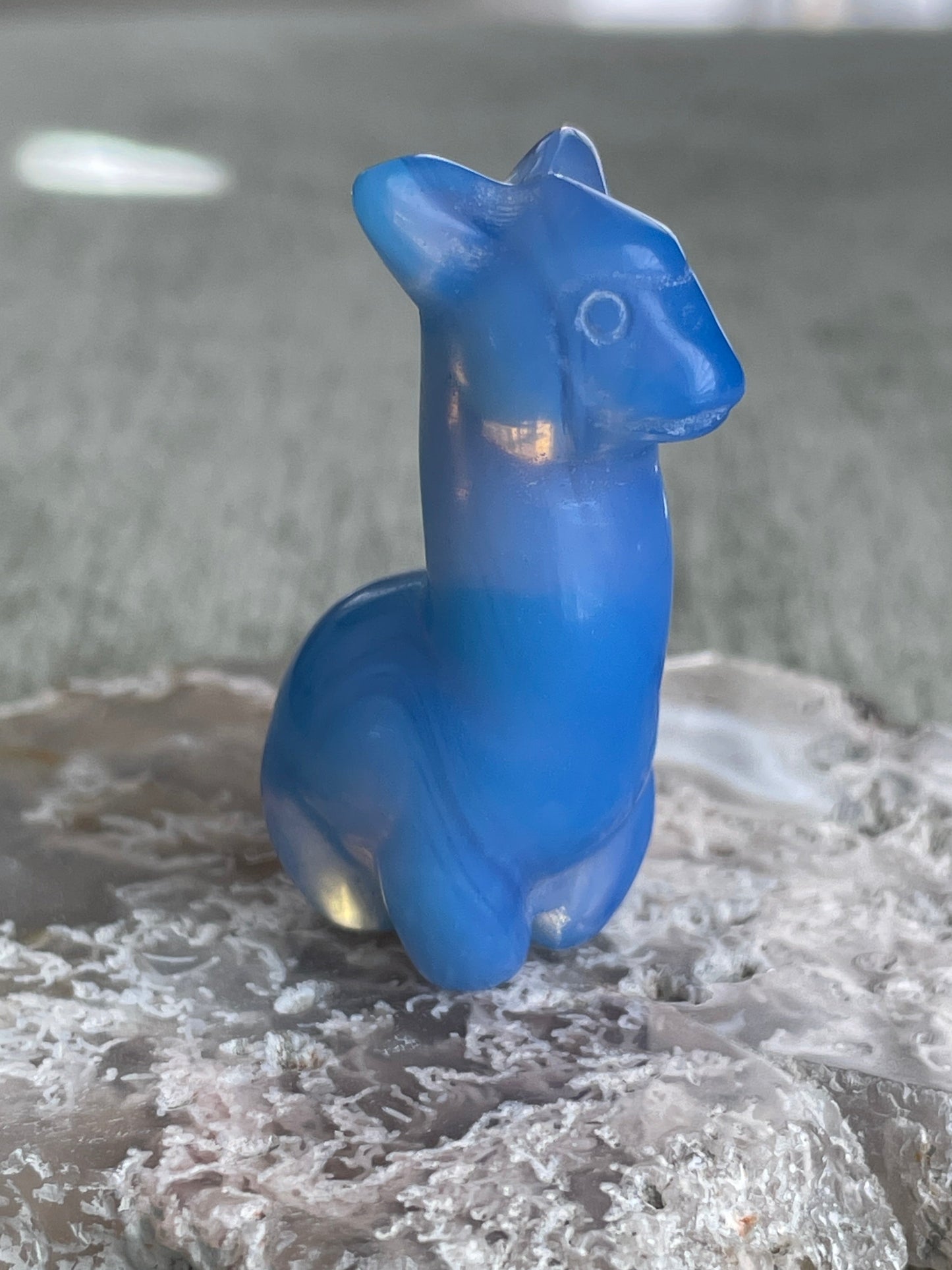 hand-carved blue opalite llama figurine, luminous gemstone carving for balance and perseverance