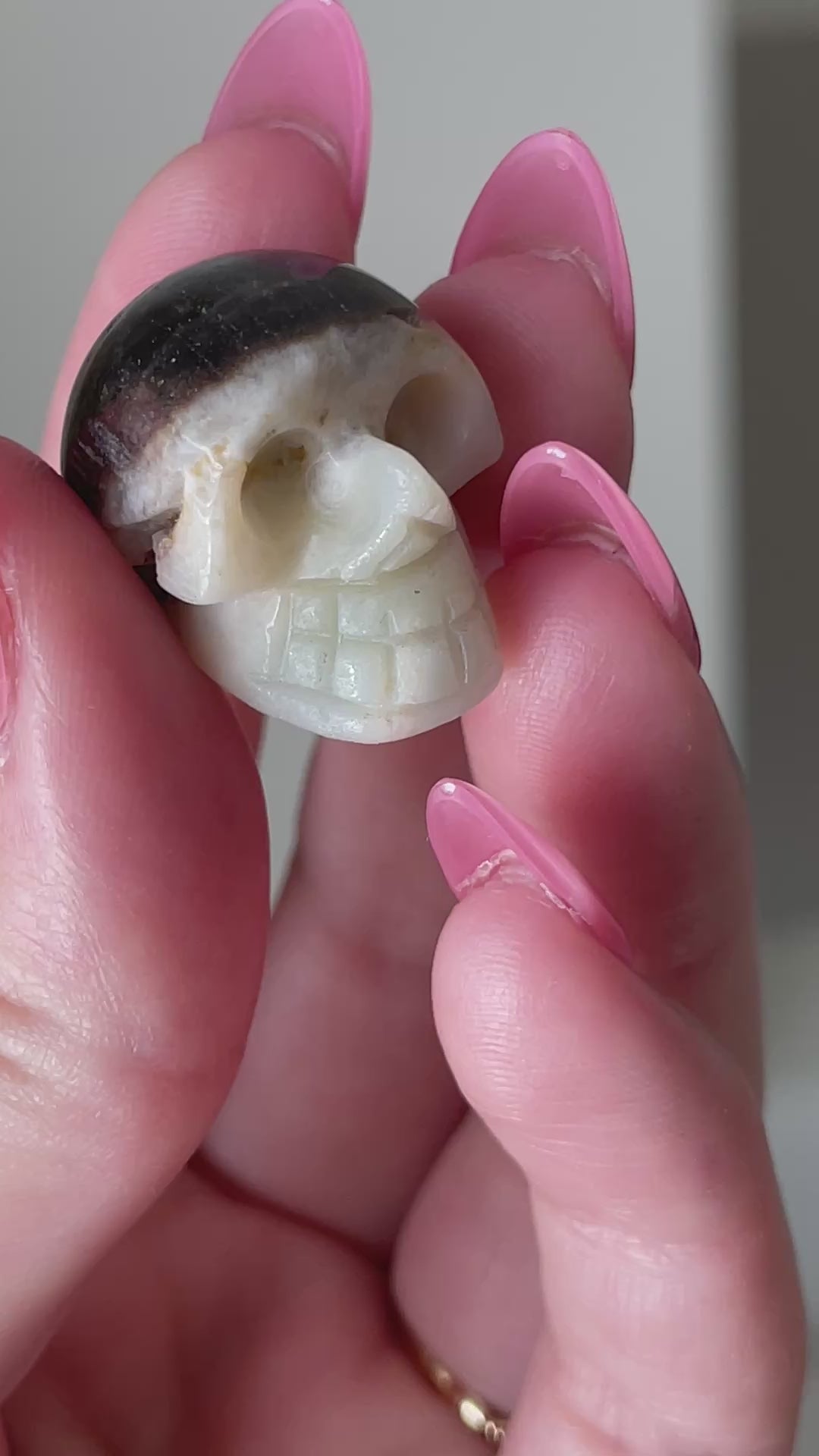 Hand-carved druzy calcite skull, small white and brown crystal for collectors.